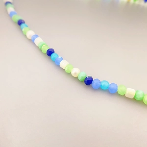 Colorful beaded necklace with shell heart and freshwater pearls in vibrant candy tones
