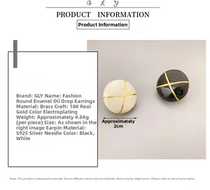 Detail showing white and black enamel button earrings with 18K gold plating and S925 silver pins