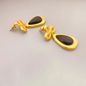 Vintage gold drop earrings with Chinese knot detail and black teardrop stones