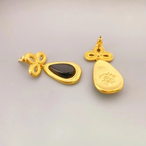 Vintage gold waterdrop earrings with black stone and Chinese knot pattern, front and back view