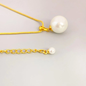 Elegant gold pearl pendant necklace with large round white pearl and adjustable box chain