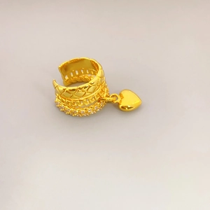 Three-layer gold ear cuff with sparkling zircon accents and a small heart pendant