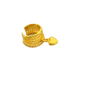 Golden multi-layer ear cuff featuring textured bands and sparkling heart charm pendant