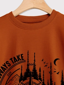 Detailed view of caramel orange sweatshirt collar with outdoor compass and mountain print