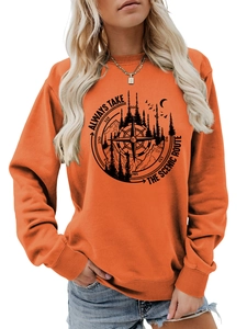 Detail of the scenic route compass print on this cozy orange crewneck sweatshirt