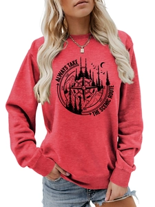 Detail of red crewneck sweatshirt with Always Take The Scenic Route outdoor graphic print