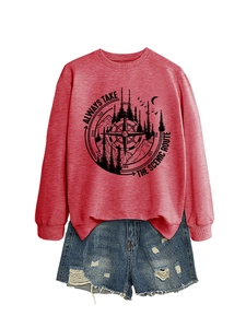 Detail of red scenic route sweatshirt paired with distressed denim shorts flat lay