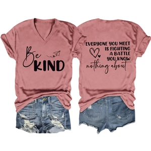 Detail of rose pink V-neck T-shirt with 'Be Kind' print and 'Everyone' back quote
