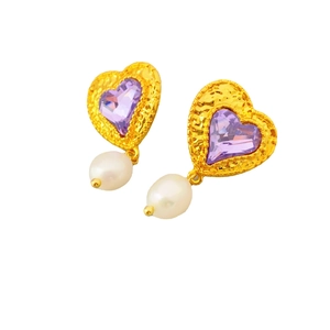Golden heart earrings with purple gemstone and teardrop pearl on white background