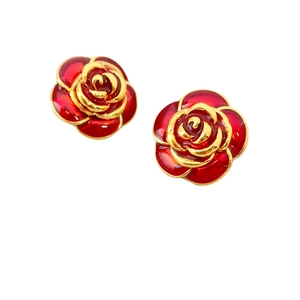 Vintage red enamel camellia stud earrings with gold plating on a clean white background