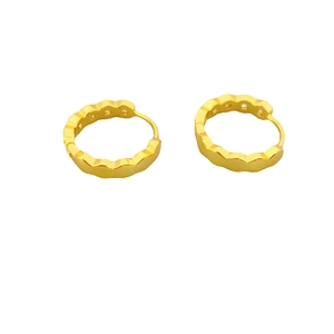 Elegant gold scalloped hoop earrings with wave design and minimalist hinged closure