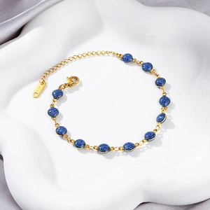 18K gold plated stainless steel bracelet with 6mm round sparkling blue glitter stones