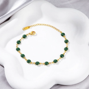 18K gold plated stainless steel bracelet with 6mm shimmering green glitter round beads