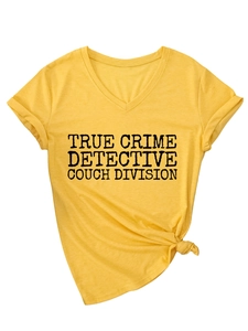 Detail of V-neck T-shirt in bright yellow with True Crime Detective slogan print