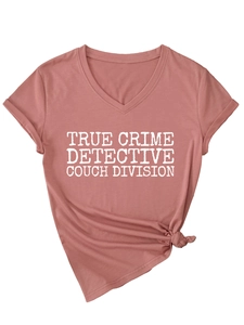 Detail of V-neck T-shirt in dusty rose with True Crime Detective print and front knot hem