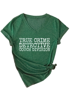 Detail of V-neck forest green T-shirt with rolled sleeves and front tie knot detail