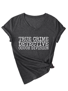 Detail of V-neck dark grey T-shirt with True Crime Detective text and rolled sleeves