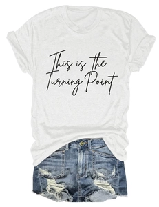 Detail of white cotton T-shirt with black cursive text and distressed denim shorts