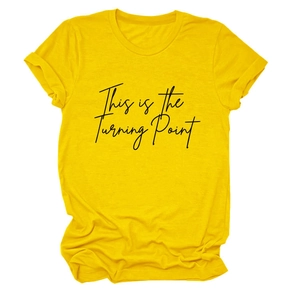 Detail of yellow cotton T-shirt featuring This is the Turning Point slogan print
