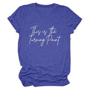 Detail of blue crew neck T-shirt featuring This is the Turning Point white print