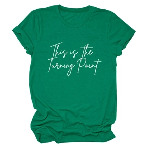 Close-up of crew neck t-shirt in dark green with This is the Turning Point print