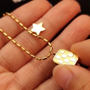 Golden titanium steel necklace with star pendant and checkered pattern rectangle charm