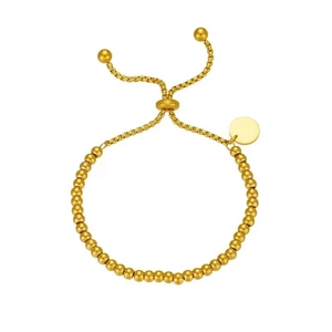 Polished gold beaded bracelet with adjustable slide clasp and circular charm tag