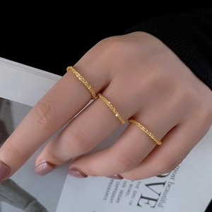 Minimalist 18k gold plated stainless steel stacked ring set with shimmering starry texture
