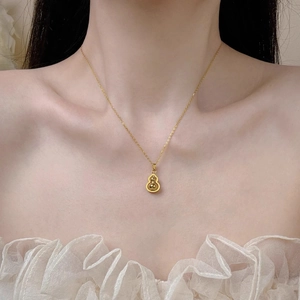 Elegante collana con pendente a zucca rotante in oro in acciaio al titanio da donna