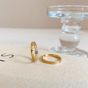 Minimalist gold titanium steel rings with engraved inspirational quotes on mirror finish