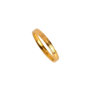 Minimalist gold stainless steel ring with engraved quote from a 45-degree angle