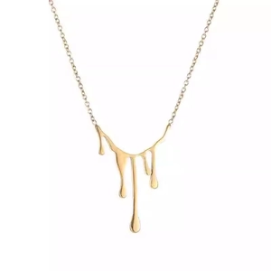 Collier avec pendentif goutte d'eau de lave irrégulière en acier doré à l'or 18 carats
