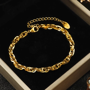 18K gold chunky link chain bracelet with lobster clasp on black velvet jewelry box