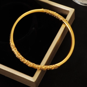 Vintage gold bangle with 4mm bauhinia scroll engravings on matte textured finish