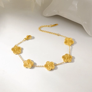 18K gold plated stainless steel bracelet featuring five delicate five-leaf clover charms