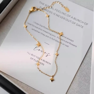 Bracelet de cheville en acier titane doré avec sequins étoiles et chaîne ajustable