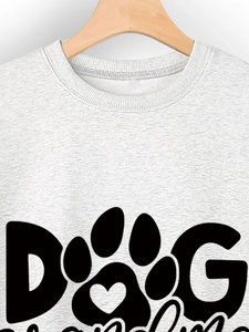 Close-up of gray sweatshirt neck and Dog Grandma print with a heart paw motif