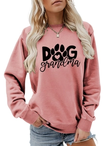 Detail of dusty pink sweatshirt featuring Dog Grandma text and heart paw print design