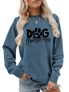 Detail view of the Dog Grandma lettering and paw print on a gray-blue round neck sweatshirt