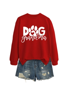 Detail of red crewneck sweatshirt with Dog Grandma print and distressed denim shorts