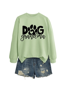 Close-up of light green Dog Grandma sweatshirt with ribbed cuffs and crewneck