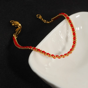 Handgeflochtenes rot-goldenes Schnurarmband für das Jahr der Schlange mit Karabinerverschluss