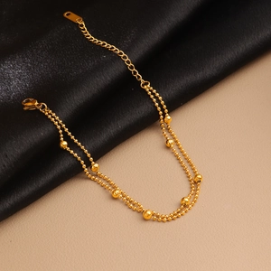 Minimalist double-layered 18K gold-plated beaded steel bracelet with adjustable chain