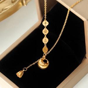 Gold plated lotus tassel necklace featuring Ping'an Xile charms and Fu character pendant