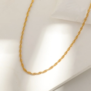 Minimalist gold plated stainless steel twisted rope chain necklace with a shiny finish