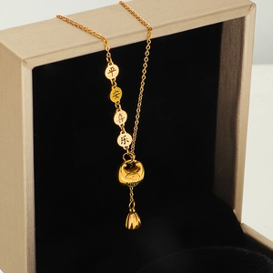 Golden lotus tassel necklace with engraved Chinese characters and a fortune lock charm