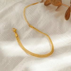 Luxe 18K gold-plated titanium steel woven bead lace bracelet with adjustable lobster clasp