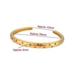 Gold stainless steel open bangle featuring colorful star rhinestones with size dimensions