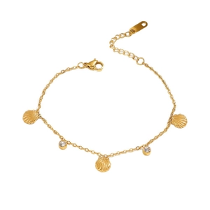 Gold stainless steel bracelet with seashell charms and clear zircons on white background