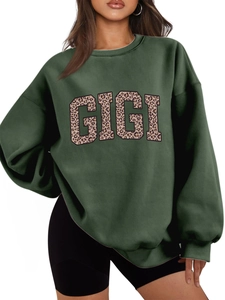 Detail of GIGI leopard print on oversized dark green thick fleece hoodie for women